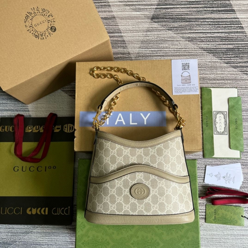 G*u*i top handle bags